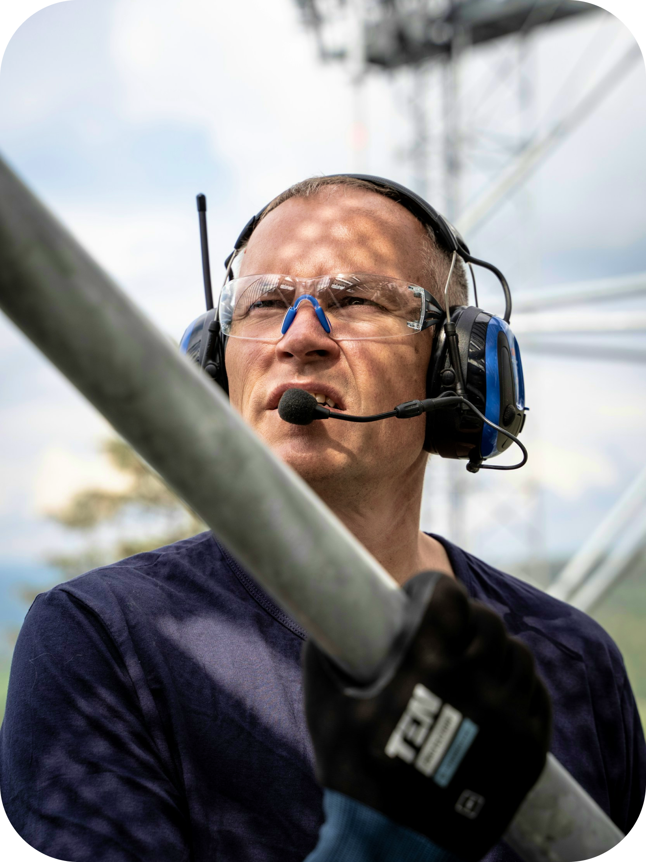 Worker with safety glasses and hearing protection